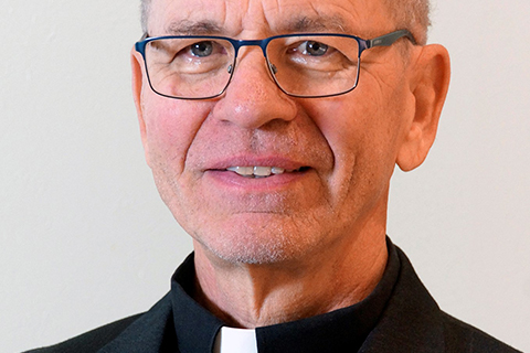 Home_page_obit_Fr_Paul_Nadolny_in_collar_June_2022